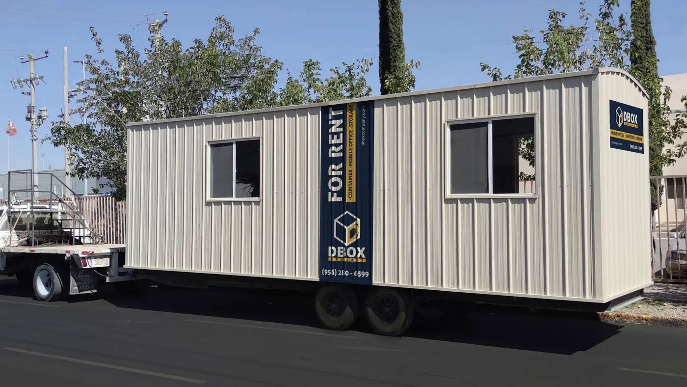 A DBOX mobile office on a flatbed, ready for delivery
